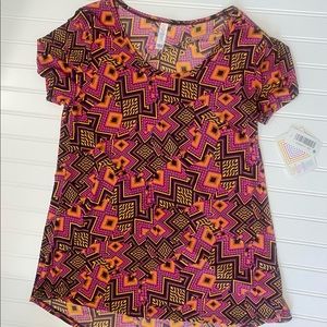 New with Tags XS Short Sleeve Classic T LuLaRoe. Slinky material Tee Shirt